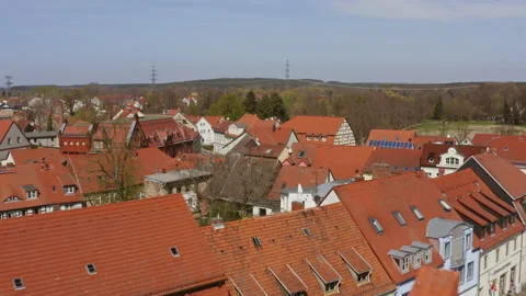 Aerial views with a flight between the town hall and the church of Perleberg Stock Footage 163105414
