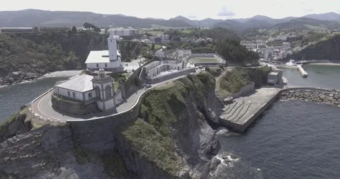 Aerial views of the Luarca lighthouse in 4k Stock Footage 138065573