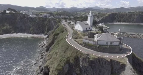 Aerial views of the Luarca lighthouse in 4k Stock Footage 138068227
