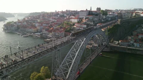 Aerial views of Luis I Bridge between Porto and Vila Nova de Gaia, crossing the  Stock Footage 242512926