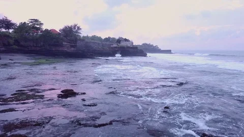 Aerial views of sunset along cliffs in Bali Stock Footage 80841604