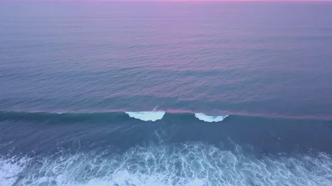 Aerial views of sunset along cliffs in Bali Vidéo 80842257