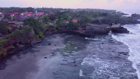 Aerial views of sunset along cliffs in Bali Stock Footage 80842710
