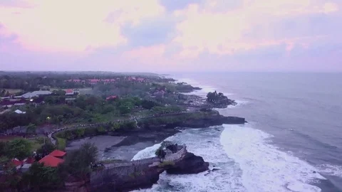 Aerial views of sunset along cliffs in Bali Stock Footage 80843272