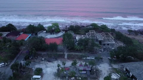 Aerial views of sunset along cliffs in Bali Stock Footage 80843413
