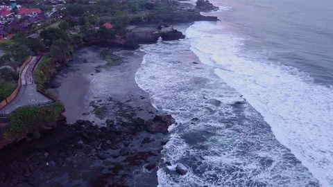 Aerial views of sunset along cliffs in Bali Stock Footage 80843521