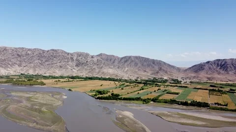 Aerial Views of Wheat Fields by Kunar River Stock Footage 274868580