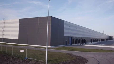 Aerial warehouse shot with loading gates and ramps Stock Footage 94801323
