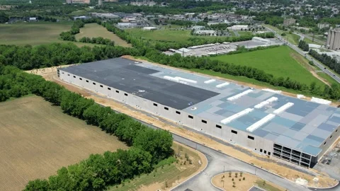 Aerial of a warehouse under construction Stock Footage 197440410
