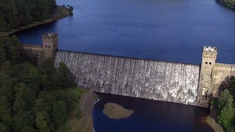 Aerial of water falling down the dam, Howden and Derwent Dams Stock Footage 109149893