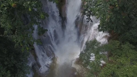 Aerial waterfall big forest Stock Footage 77780948