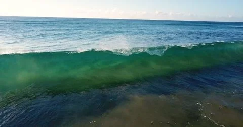 Aerial of wave crashing (breaking) Stock Photos