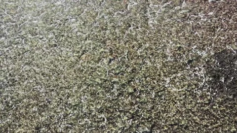 Aerial waves and rocks Stock Footage 132378067