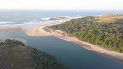 Aerial of waves breaking on a wild pristine coastline Stock Footage 201501753