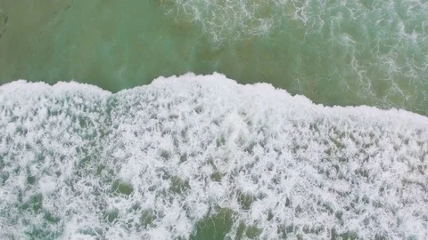 Aerial Waves crashing Stock Footage 73013542