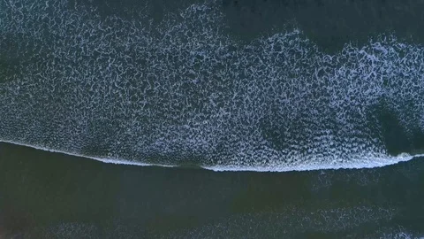 Aerial of waves far to close on Farstad sand beach in Norway Stock Footage 100352246