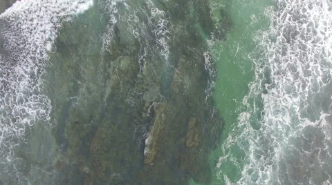 Aerial Waves Washing Onto a Beach Video stock 62444720