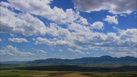 Aerial of white clouds on blue sky above green landscape, Picture-prefect blue Stock Footage 109457302