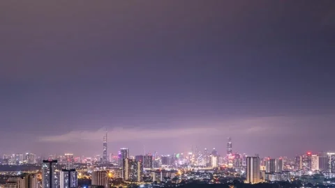 Aerial wide angle of Kuala Lumpur time lapse at night with dramatic clouds and Stock Footage 337906111