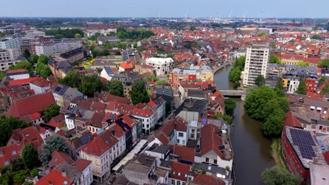 Aerial wide angle panoramic view along a winding city river canal Stock Footage 339361063