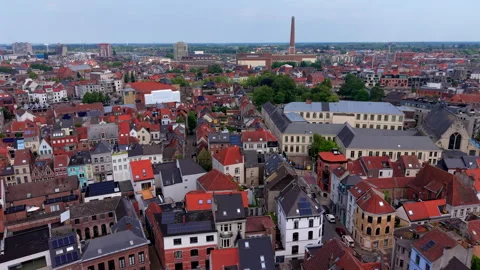 Aerial wide angle panoramic view looking over dense historic European city Stock Footage 339365526