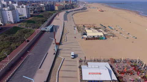Aerial wide angle panoramic view of a curved coastal beach promenade Stock Footage 339631291
