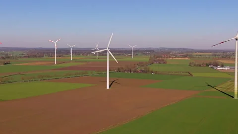 Aerial wide angle panoramic view of modern wind turbines generating clean Stock Footage 339632811