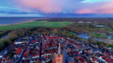 Aerial wide angle panoramic view of a historic medieval town with red tiled Stock Footage 339978051