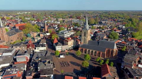 Aerial wide angle panoramic view of a sunny town square and historic brick Stock Footage 339979277