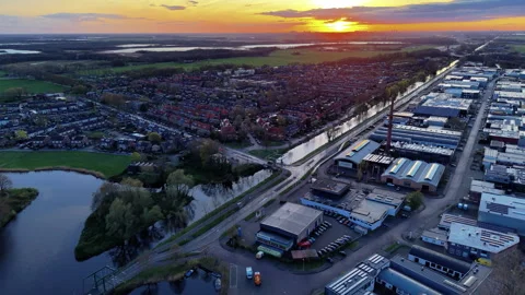 Aerial wide angle panoramic view of a modern industrial zone and a suburban Stock Footage 339979314