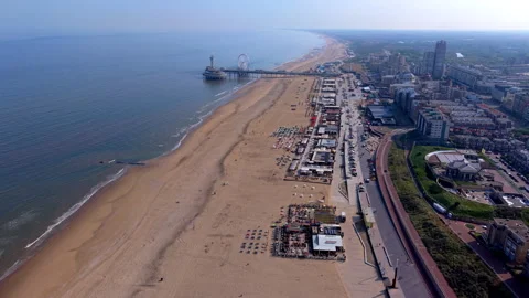 Aerial wide angle panoramic view of the famous Scheveningen pier ferris Stock Footage 340041507