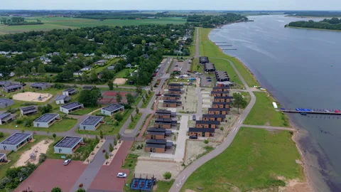 Aerial wide angle panoramic view of a modern eco resort holiday park Video stock 340105380
