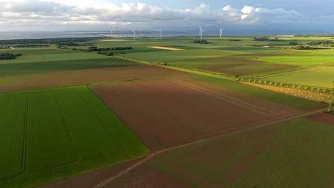 Aerial wide angle panoramic view of extensive green and brown agricultural Stock Footage 340107911