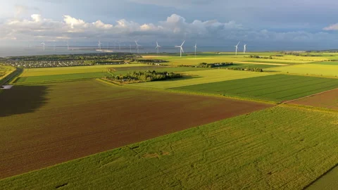 Aerial wide angle perspective of beautiful agricultural patchwork fields Stock Footage 340105988