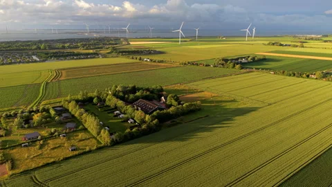 Aerial wide angle perspective of a traditional country farm estate nestled Stock Footage 340106018