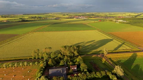 Aerial wide angle perspective of a traditional country farm estate Stock Footage 340107804