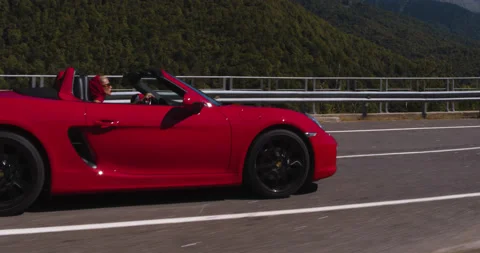 Aerial Wide Angle Red Cabriolet Open Road Drive Stock Footage 160151161