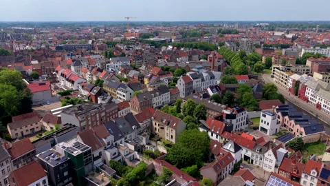 Aerial wide angle shot over a dense European city residential neighborhood Stock Footage 338306994
