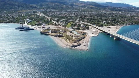 Aerial wide angle shot of seaside castle, port and city by the sea Stock Footage 338108199