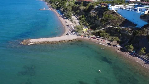 Aerial wide angle view of coastal village and resort beach in Greece Stock Footage 343940917