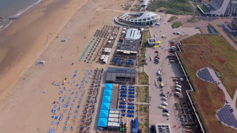 Aerial wide angle view of colorful summer beach clubs modern seaside Stock Footage 340105202