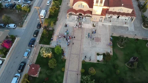 Aerial wide angle view of Orthodox church courtyard gathering in Greece Stock Footage 343945903