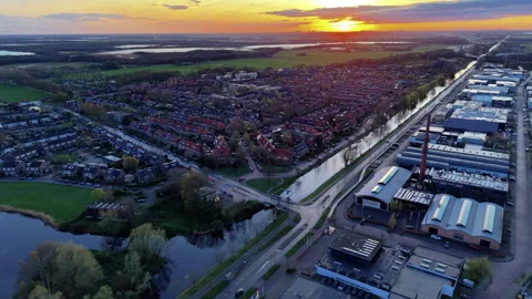 Aerial wide angle view over an industrial commercial estate and residential.. Stock Footage 339282153