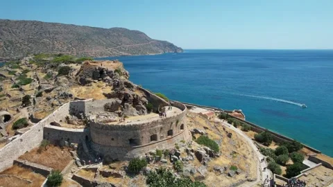 Aerial wide angle view of Spinalonga fortress walls and blue sea Stock Footage 337048542