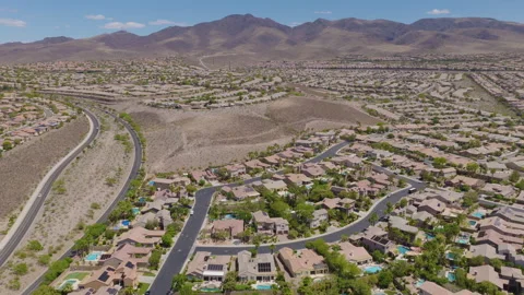 Aerial Wide Pullback Shot of Henderson Suburban Homes Near Desert Mountains Stock-Footage 333803935