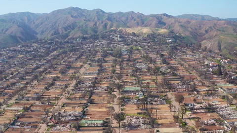 Aerial wide pullback shot of Pacific Palisades California after the fire Stock Footage 308181208