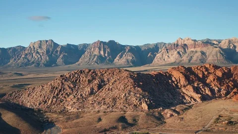 Aerial wide pullback shot of scenic Calico Basin and Red Rock Canyon mountains Stock Footage 121224560