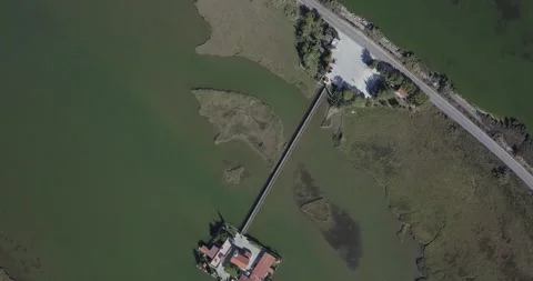 Aerial wide shot looking down a lagoon Stock Footage 258357953