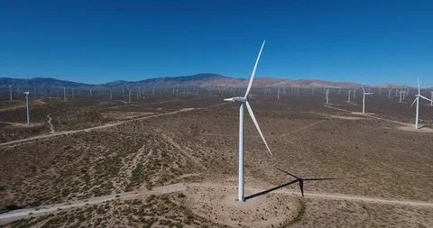 Aerial by windmill farm Stock Footage 104813234