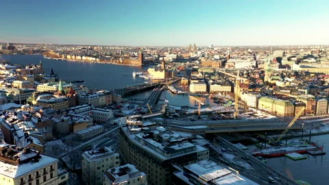 Aerial winter drone view of Sodermalm, Slussen and Golden Bridge in Stockholm Stock Footage 149147274
